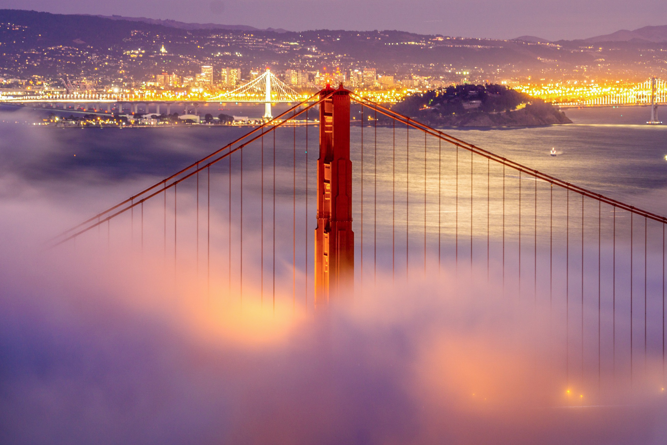 Golden Gate Bridge peeking through the famous San Francisco fog